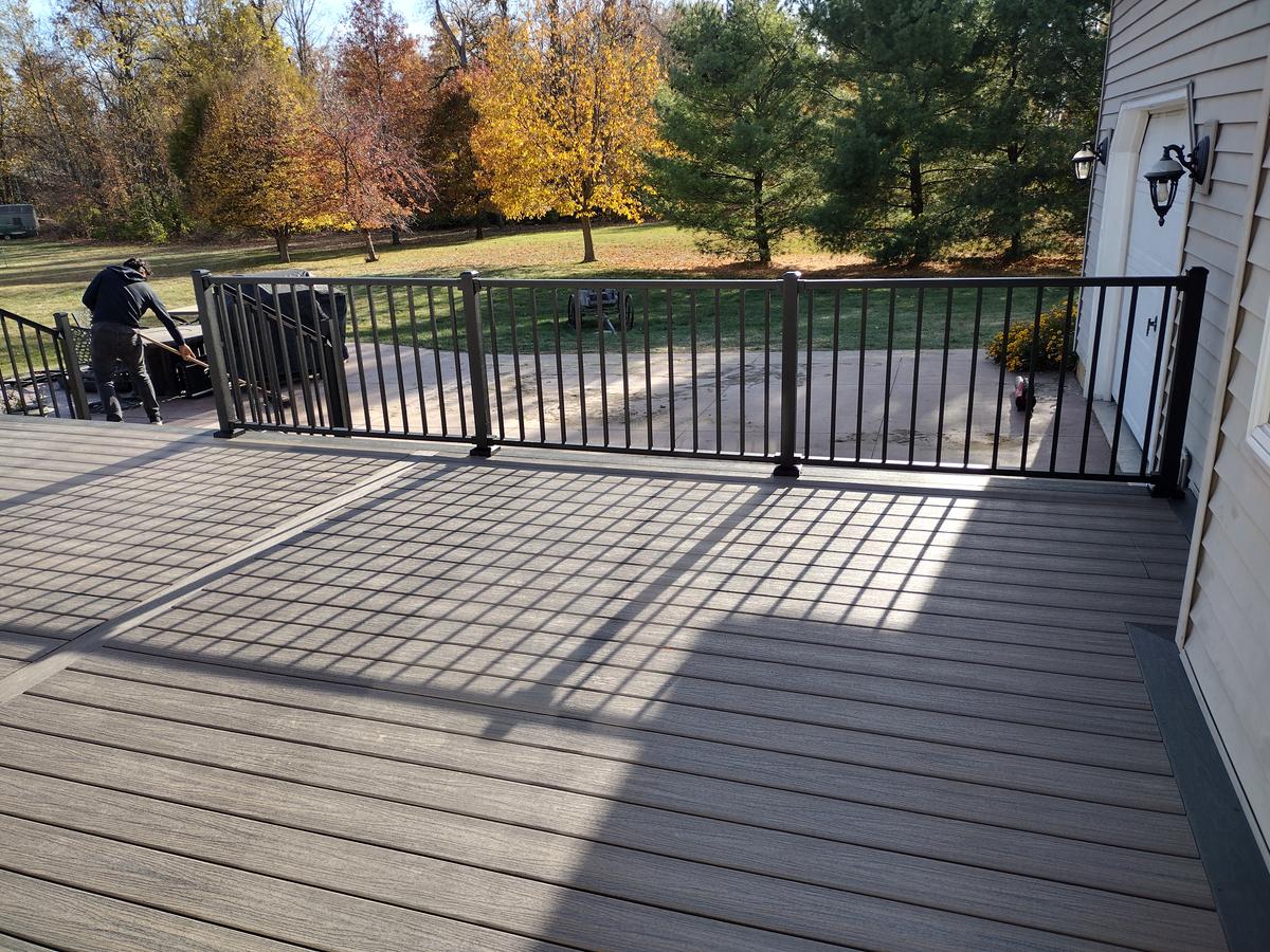Grey composite deck with black aluminum railings