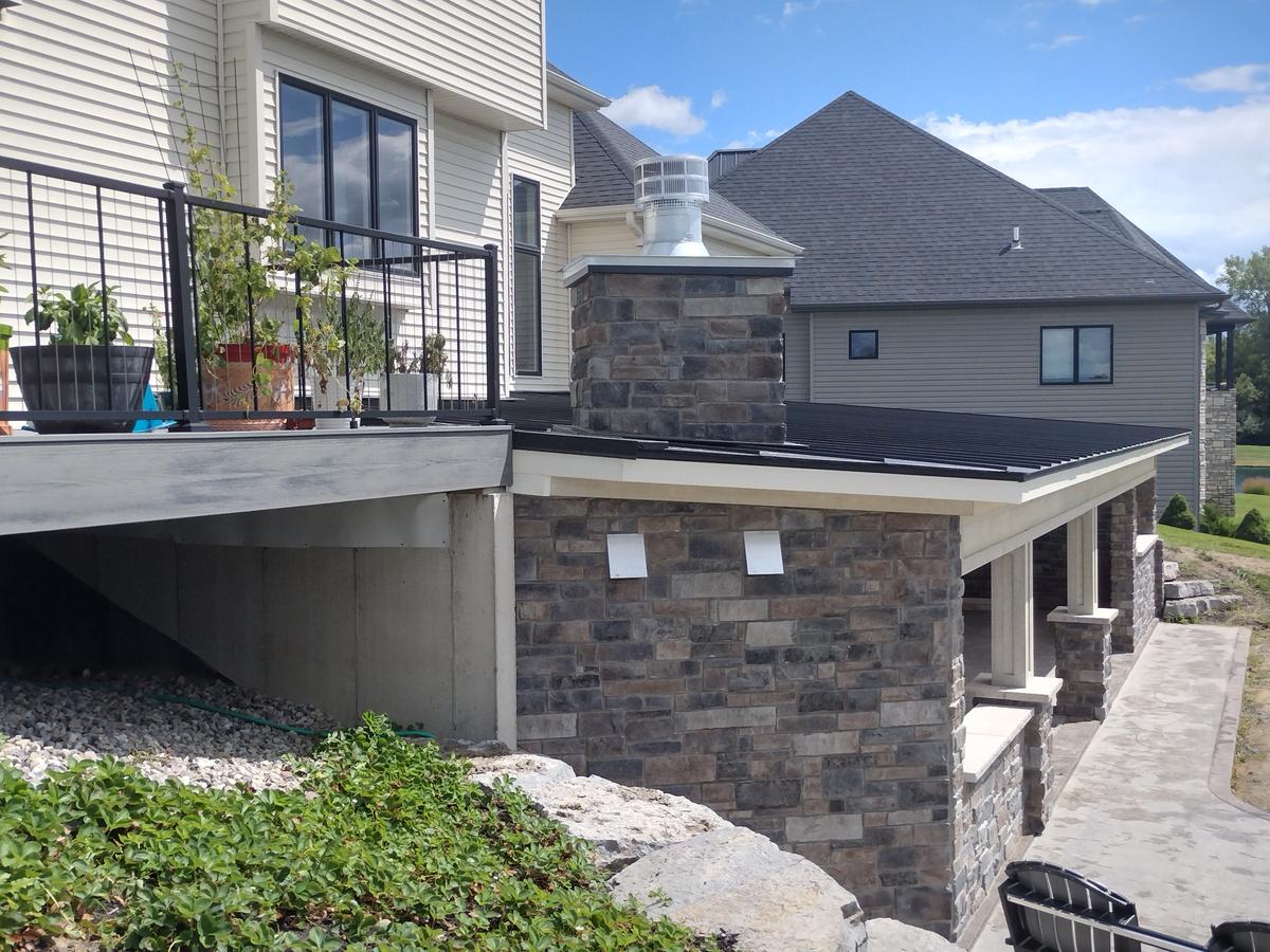 Custom deck with stone outdoor kitchen in Northwest Ohio