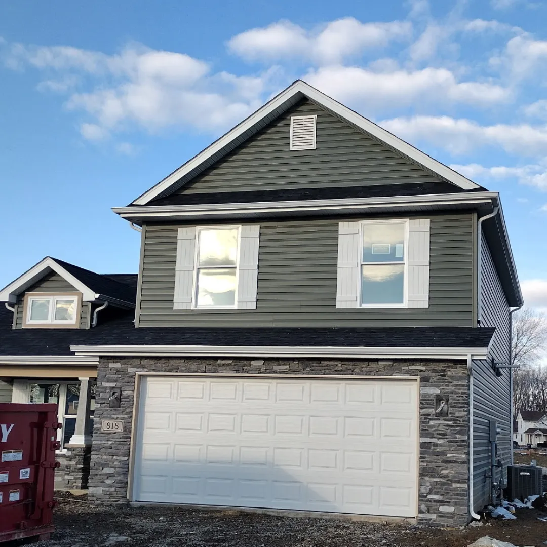 New construction gutter installation on two-story home